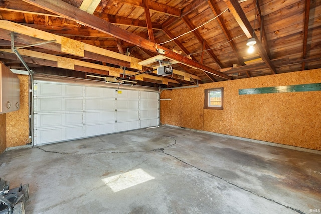 1425 Adams St, Lafayette, IN 47905 - garage with a garage door opener and wooden ceiling
