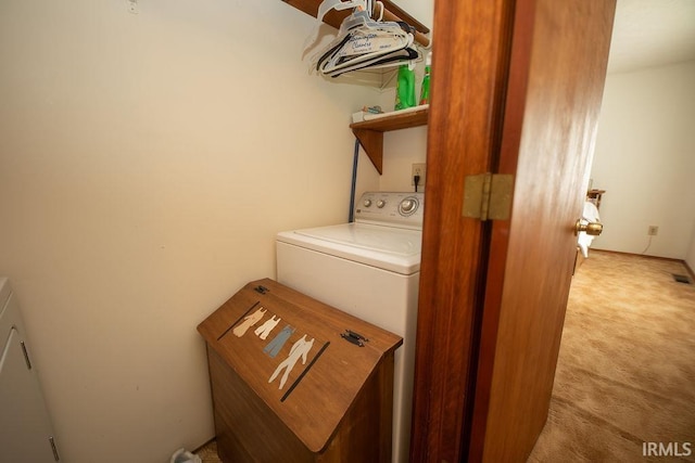 washroom featuring washer / clothes dryer and carpet flooring