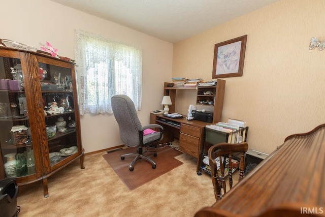view of carpeted office space