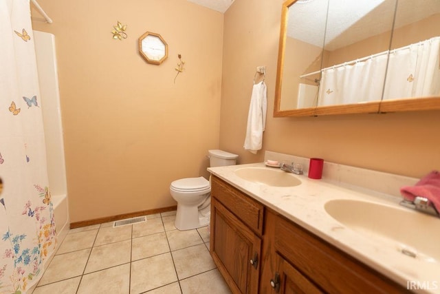 full bath featuring toilet, double vanity, baseboards, tile patterned floors, and shower / bathtub combination with curtain