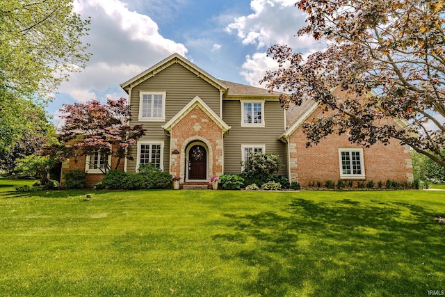 3935 Shana Jane Dr, Lafayette, IN 47905 - traditional-style home featuring brick siding and a front lawn