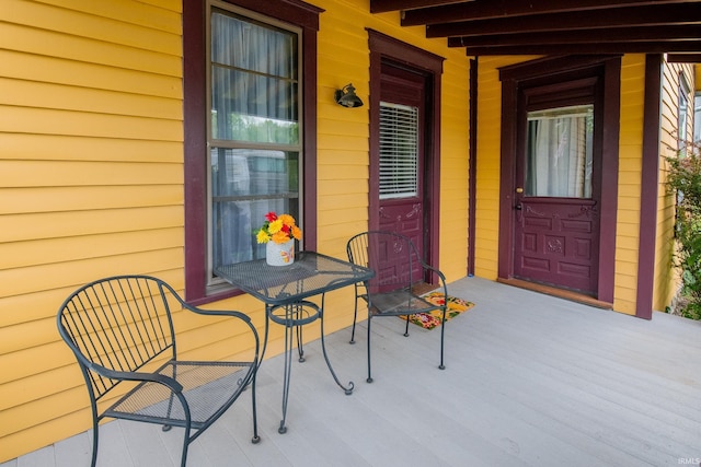doorway to property featuring a porch