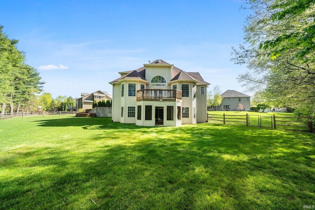 back of property with a wooden deck