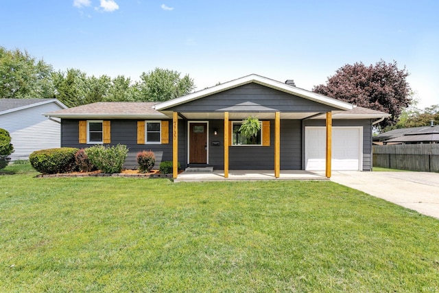 single story home with an attached garage, concrete driveway, and covered porch