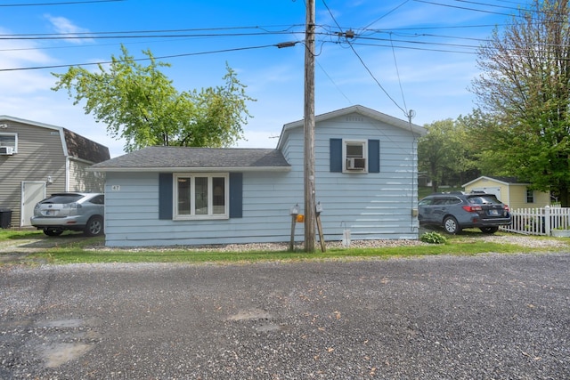 47 Ems W29B Ln, North Webster, IN 46555 - view of front of house with fence and a shingled roof