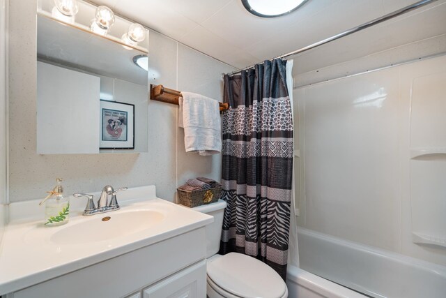 47 Ems W29B Ln, North Webster, IN 46555 - full bathroom featuring shower / tub combo with curtain, toilet, and vanity