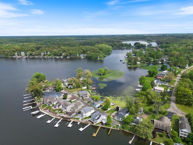 47 Ems W29B Ln, North Webster, IN 46555 - aerial overview of property's location featuring a nearby body of water and a heavily wooded area