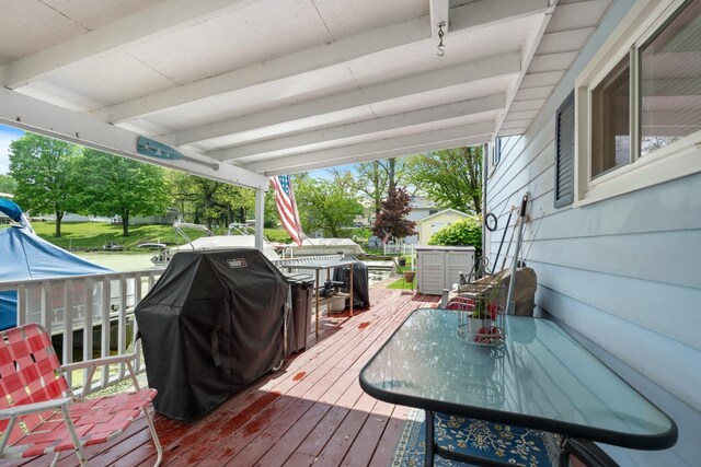 47 Ems W29B Ln, North Webster, IN 46555 - wooden terrace featuring outdoor dining area and area for grilling