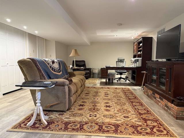 2110 Denson Ave, Bedford, IN 47421 - living room with wood finished floors, an office area, and recessed lighting