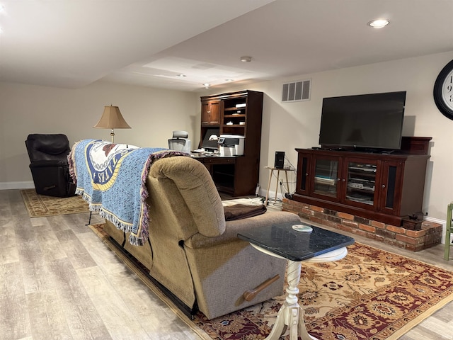 2110 Denson Ave, Bedford, IN 47421 - living area featuring light wood-style floors, recessed lighting, baseboards, and a desk
