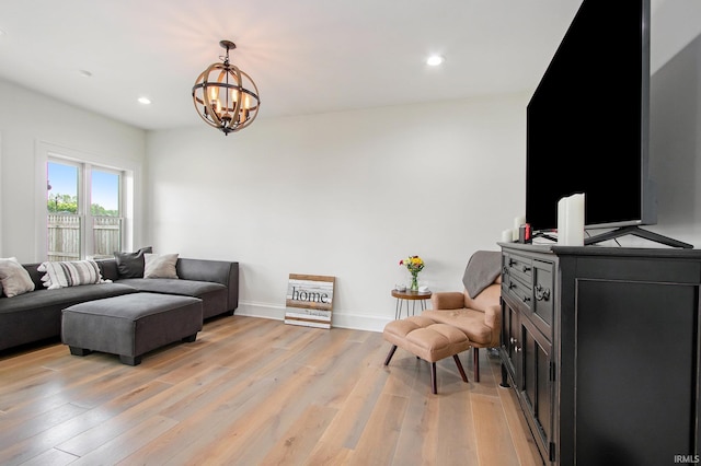 4 Edgewater Pl, Elkhart, IN 46516 - living room featuring a chandelier, light wood-type flooring, baseboards, and recessed lighting
