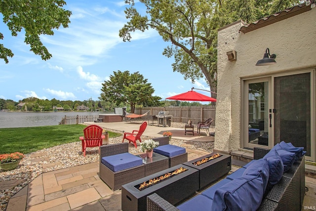4 Edgewater Pl, Elkhart, IN 46516 - view of patio with a water view, an outdoor living space with a fire pit, and area for grilling