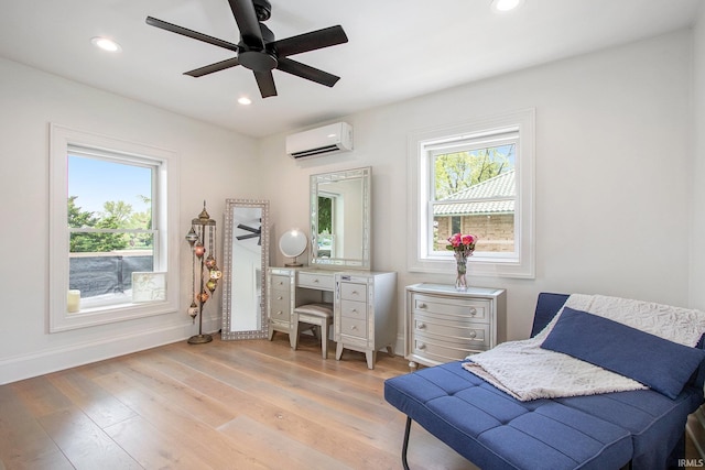 4 Edgewater Pl, Elkhart, IN 46516 - living area with a wall mounted air conditioner, plenty of natural light, a ceiling fan, recessed lighting, and light wood-style floors