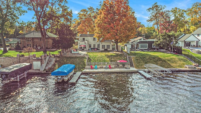 4 Edgewater Pl, Elkhart, IN 46516 - view of yard with a boat dock and a water view