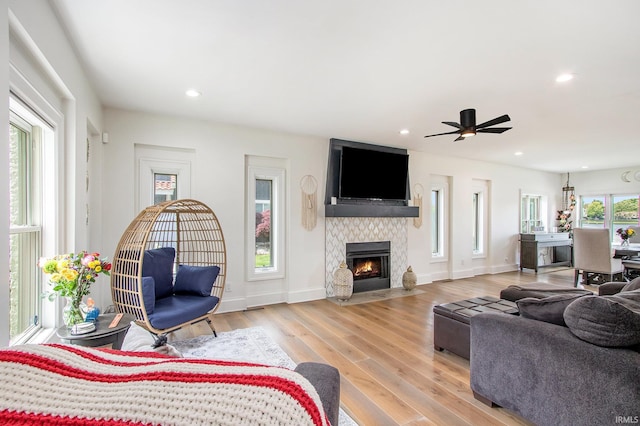 4 Edgewater Pl, Elkhart, IN 46516 - living room with a ceiling fan, light wood-type flooring, a fireplace, baseboards, and recessed lighting