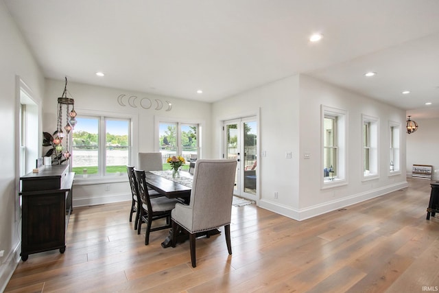 4 Edgewater Pl, Elkhart, IN 46516 - dining room featuring baseboards, light wood-type flooring, and recessed lighting