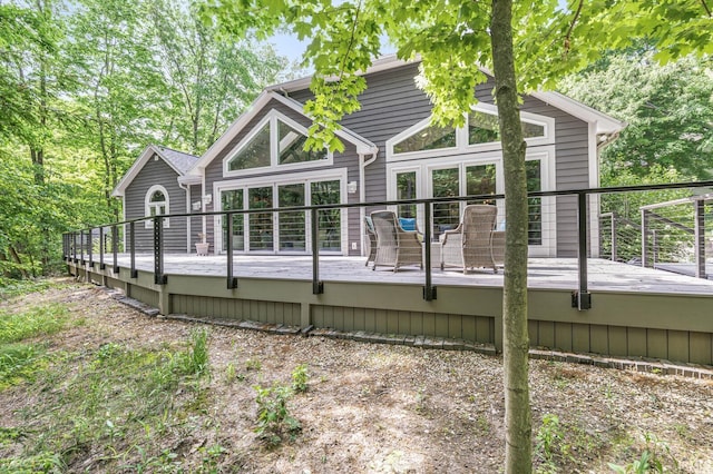back of property with a deck