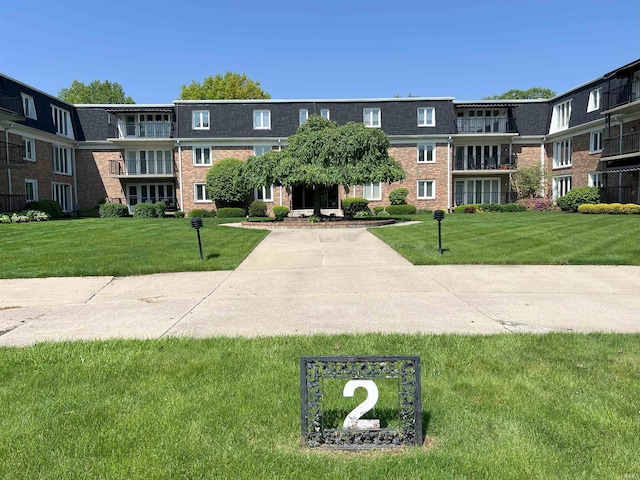 4501 N Wheeling Ave Unit 2-303, Muncie, IN 47304 - view of community featuring a yard