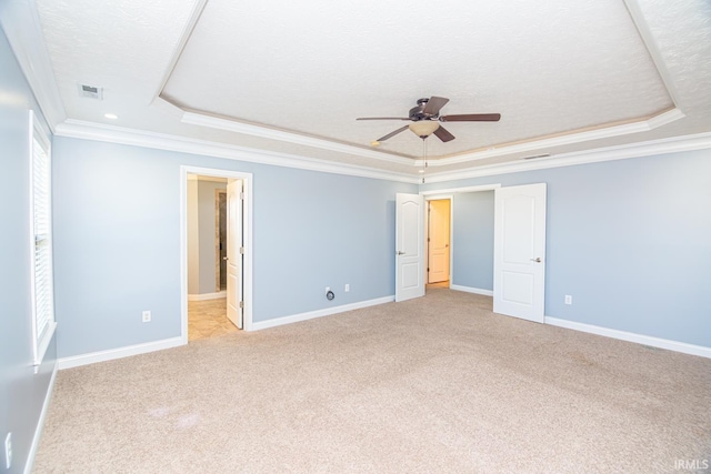 3905 Rushgrove Dr, Lafayette, IN 47909 - unfurnished bedroom with a raised ceiling, crown molding, light colored carpet, baseboards, and ceiling fan