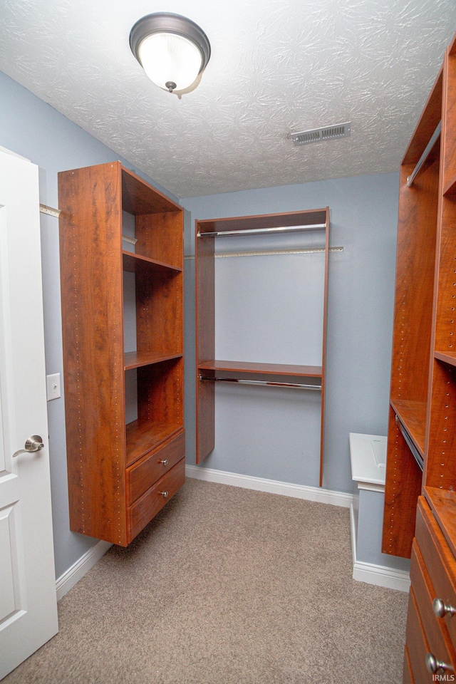 3905 Rushgrove Dr, Lafayette, IN 47909 - walk in closet featuring carpet