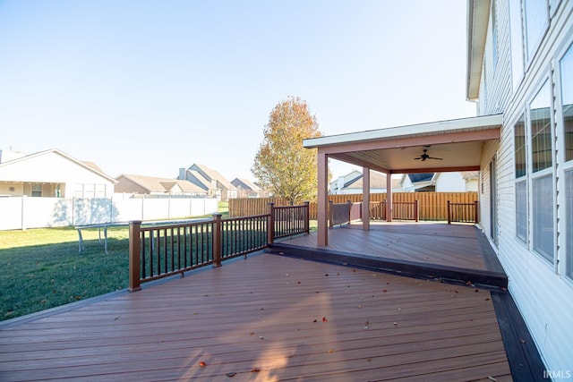 3905 Rushgrove Dr, Lafayette, IN 47909 - wooden terrace with a ceiling fan, a residential view, and a trampoline