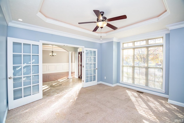 3905 Rushgrove Dr, Lafayette, IN 47909 - carpeted empty room with crown molding, french doors, decorative columns, a raised ceiling, and ceiling fan