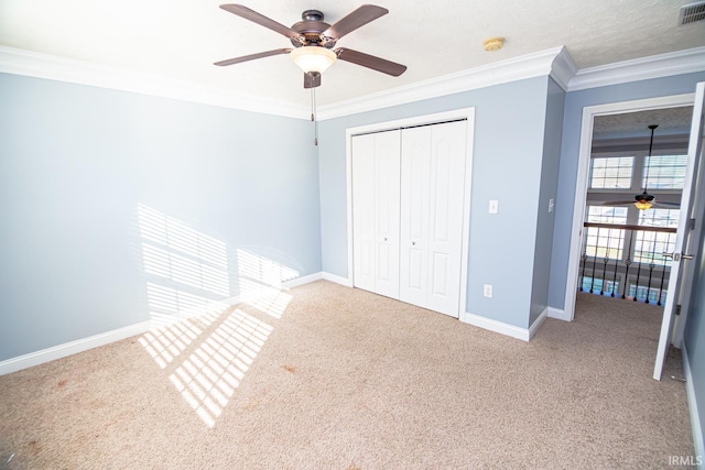 3905 Rushgrove Dr, Lafayette, IN 47909 - unfurnished bedroom featuring crown molding, carpet, a closet, baseboards, and ceiling fan
