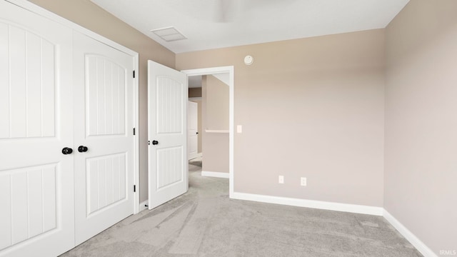 5937 Liam Ln, Fort Wayne, IN 46818 - unfurnished bedroom featuring light colored carpet, baseboards, and a closet