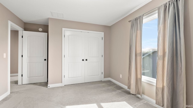 5937 Liam Ln, Fort Wayne, IN 46818 - unfurnished bedroom featuring carpet, baseboards, and a closet