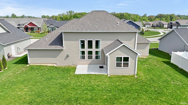 5937 Liam Ln, Fort Wayne, IN 46818 - back of property with a residential view, a patio area, and a shingled roof