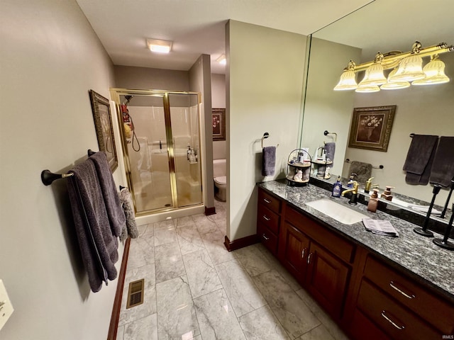 16529 State Road 1st Rd, Spencerville, IN 46788 - bathroom with marble finish flooring, toilet, vanity, and a shower stall