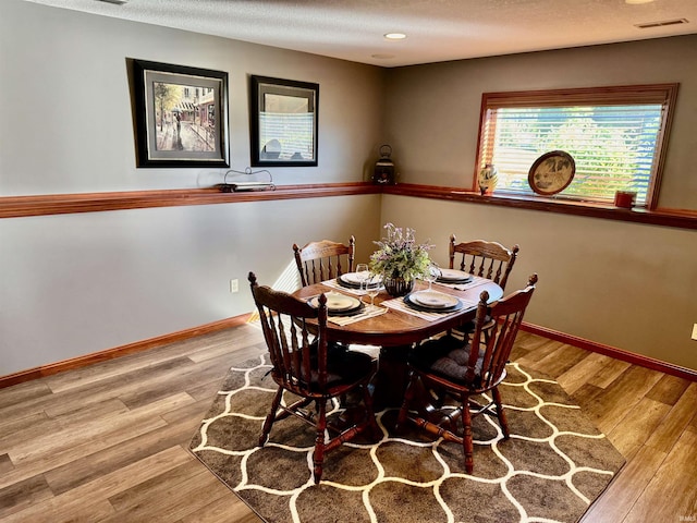 16529 State Road 1st Rd, Spencerville, IN 46788 - dining room featuring wood finished floors, baseboards, and recessed lighting