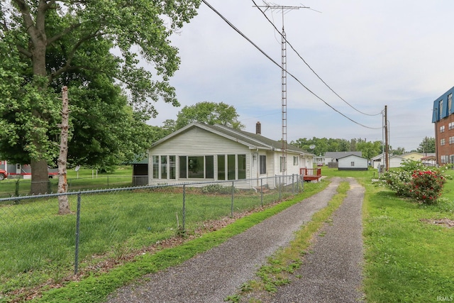 511 Pearl St, Rockport, IN 47635 - rear view of house with driveway and a chimney