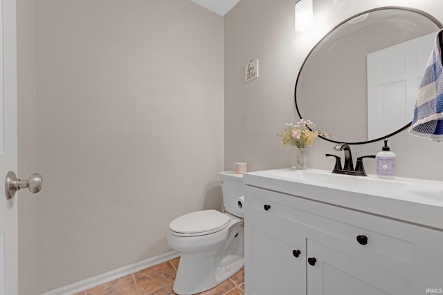 10731 Willow Creek Dr, Fort Wayne, IN 46845 - half bathroom featuring toilet, baseboards, and vanity