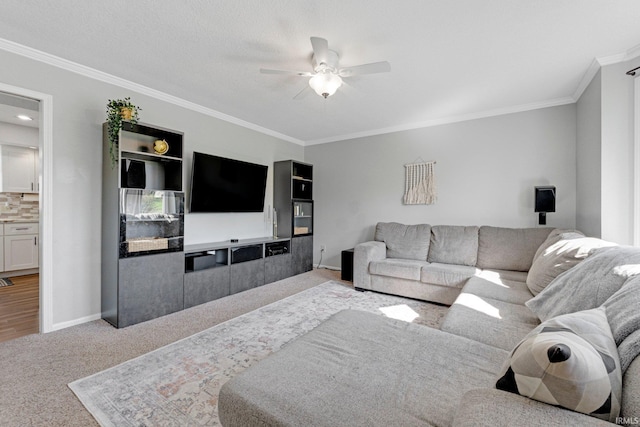 10731 Willow Creek Dr, Fort Wayne, IN 46845 - living area featuring ceiling fan, light carpet, ornamental molding, and baseboards