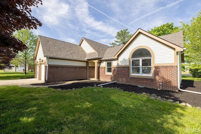 103 Bluebird Ln, Sulphur Springs, IN 47388 - single story home featuring brick siding, a front lawn, an attached garage, a shingled roof, and driveway