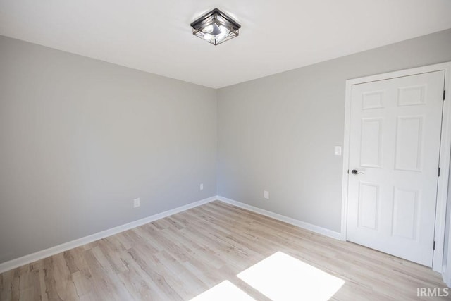 103 Bluebird Ln, Sulphur Springs, IN 47388 - empty room with light wood finished floors and baseboards