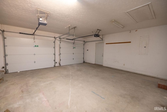 103 Bluebird Ln, Sulphur Springs, IN 47388 - garage with electric panel and a garage door opener