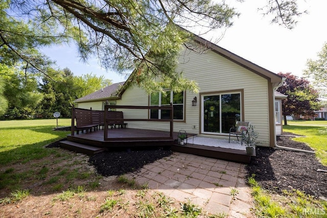 103 Bluebird Ln, Sulphur Springs, IN 47388 - back of property featuring a deck and a lawn