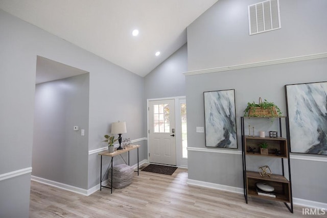 103 Bluebird Ln, Sulphur Springs, IN 47388 - entryway with wood finished floors, high vaulted ceiling, baseboards, and recessed lighting