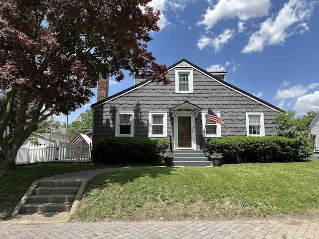 134 E 3rd St, Peru, IN 46970 - bungalow-style home featuring a chimney and entry steps