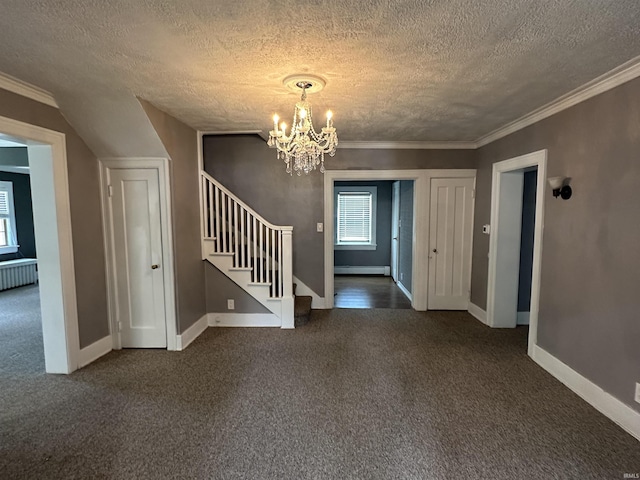 134 E 3rd St, Peru, IN 46970 - foyer entrance featuring dark colored carpet, stairs, a chandelier, a baseboard radiator, and a textured ceiling