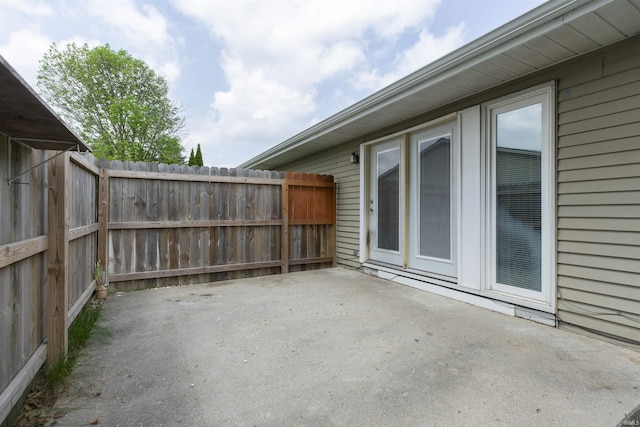view of patio featuring fence