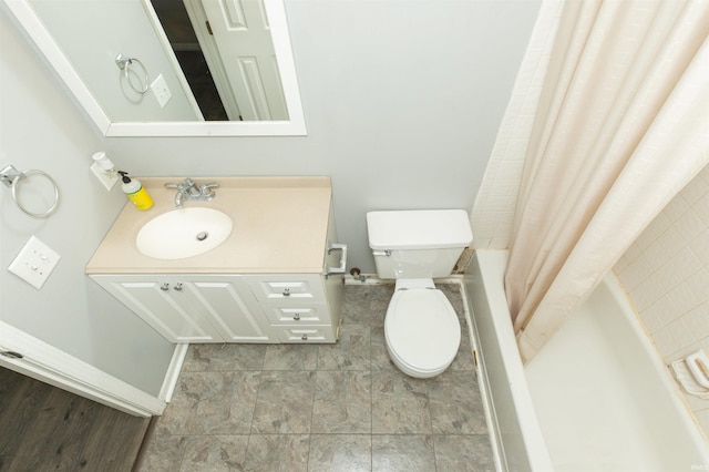 full bathroom featuring vanity, toilet, and shower / bath combo with shower curtain