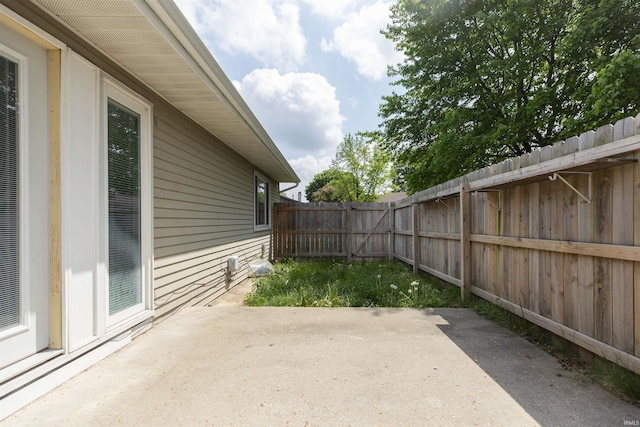 view of patio / terrace featuring fence