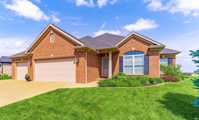 3121 Ralston Dr, Evansville, IN 47715 - view of front facade featuring brick siding, an attached garage, driveway, a front lawn, and a shingled roof
