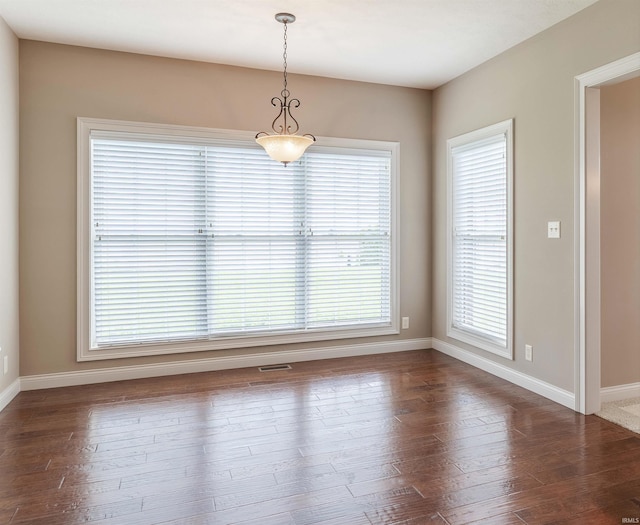3121 Ralston Dr, Evansville, IN 47715 - unfurnished room featuring baseboards and dark wood-style flooring