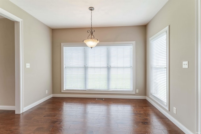 3121 Ralston Dr, Evansville, IN 47715 - empty room with dark wood-style flooring and baseboards
