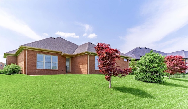 3121 Ralston Dr, Evansville, IN 47715 - rear view of property with brick siding and roof with shingles