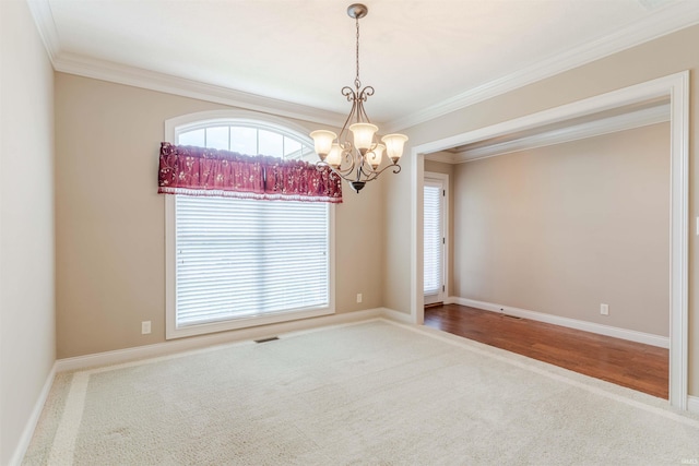 3121 Ralston Dr, Evansville, IN 47715 - carpeted spare room with a chandelier, crown molding, and baseboards